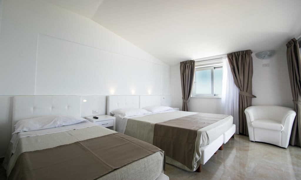 Hotel Resort Rocca Di Vadaro Капо-Ватикано Номер фото